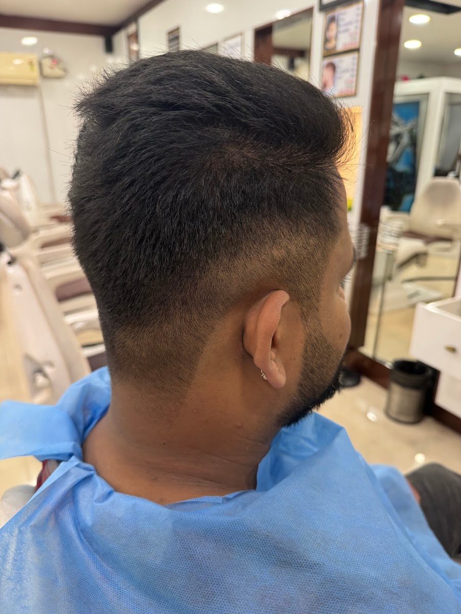 Back view of a freshly finished taper fade at Dreams Men's Salon, Bengaluru.