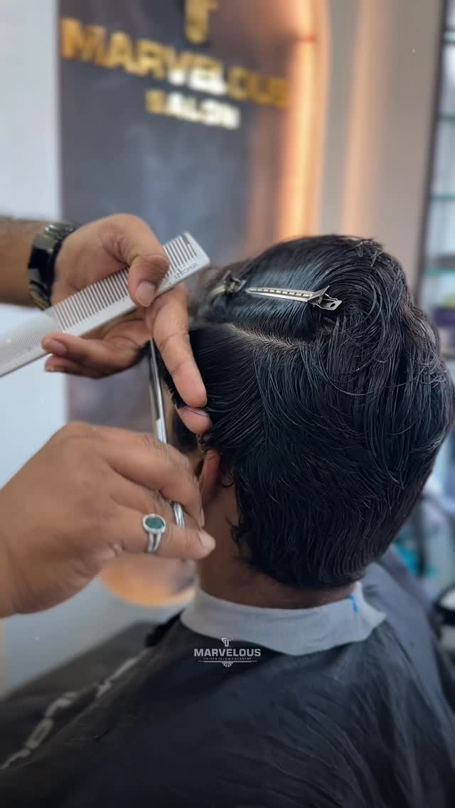 Close-up scissor work: precision cutting at Marvelous