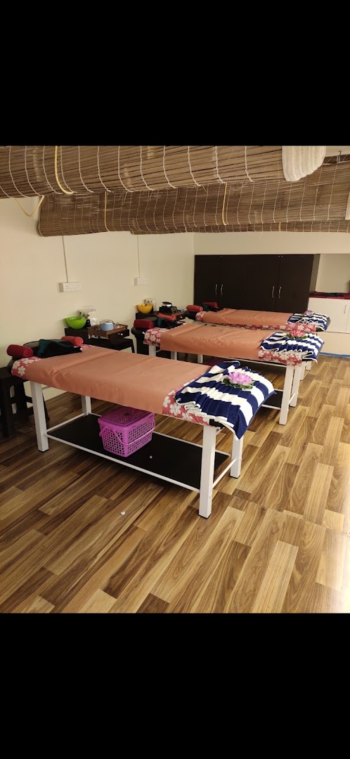 A private spa room with a facial bed at Marvelous
